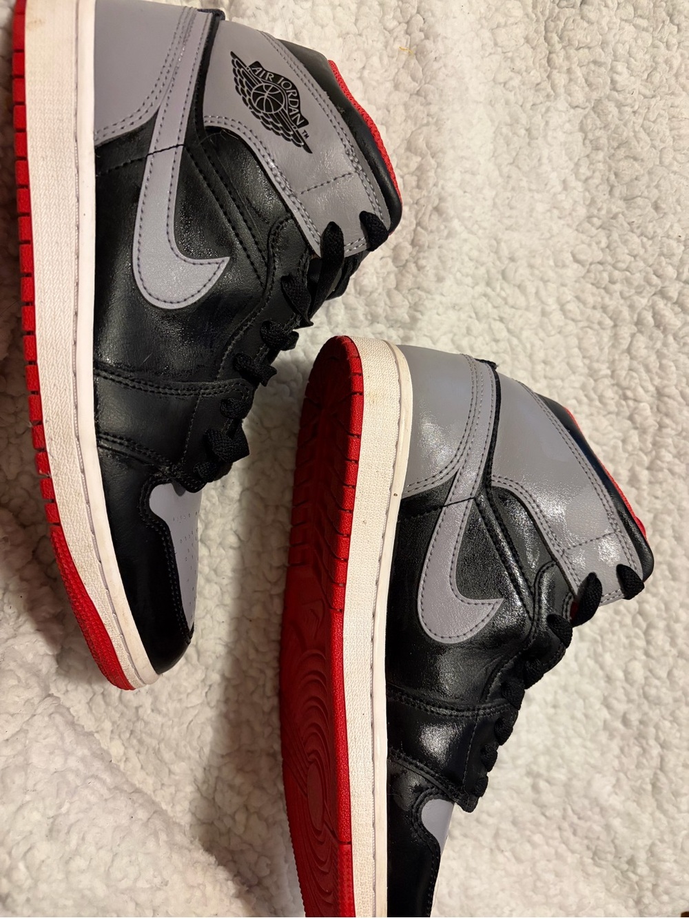 Jordan High-Top Sneakers in Black, Gray, and Red